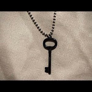 Tiffany & Co rare Titanium Key Pendant and 18” Sterling Silver Bead Necklace